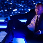 black-man-relaxed-sitting-chill-business-attire